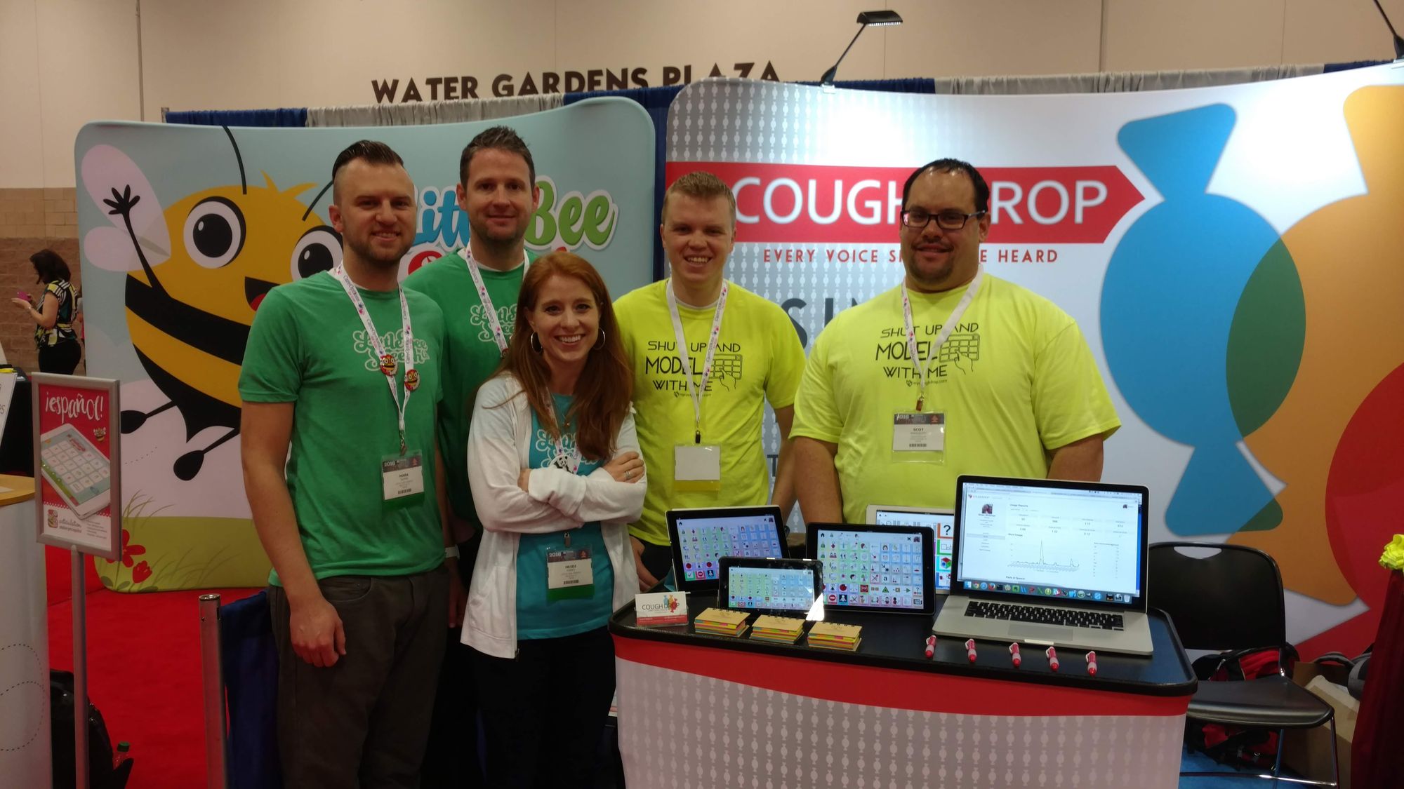 Brian Whitmer & Scot Wahlquist with other conference attendees in front of the CoughDrop booth.
